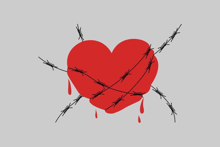Illustration of a broken heart wrapped in barbed wire, symbolizing emotional pain and a toxic relationship.